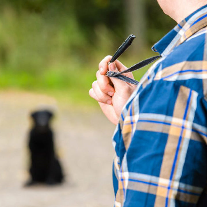 man holding a whistle